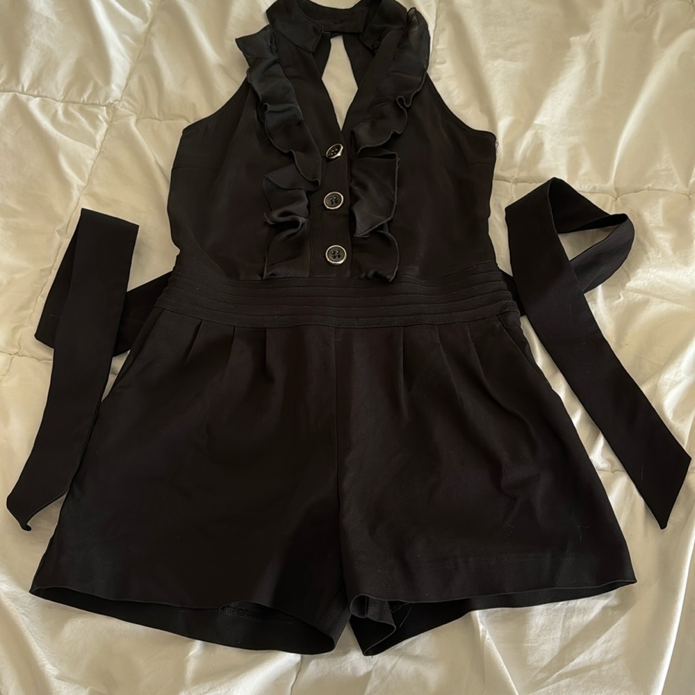 Sleeveless black shorts romper